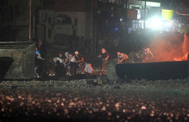 Israel kills Palestinian, dozens injured in West Bank protest
