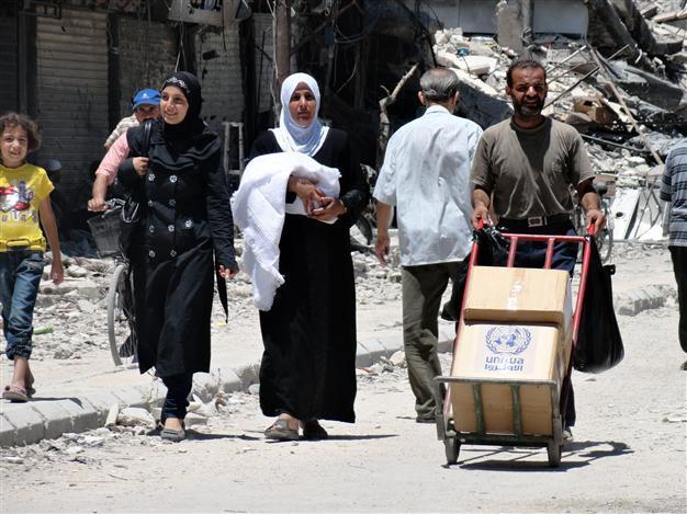 First UN aid convoy enters Syria from Turkey