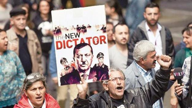 German police launch probe into poster depicting Turkish PM with Nazi symbol