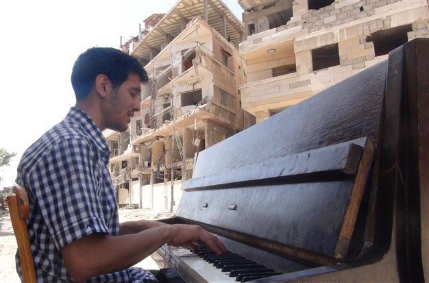 In Syrias starving Yarmuk camp, a pianist conjures hope