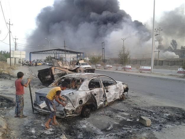 ISIL takes more Turkish drivers hostage in northern Iraq as 500,000 flee Mosul