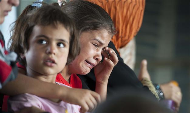 US planes strike militants, drop aid near ethnic Turkmen town