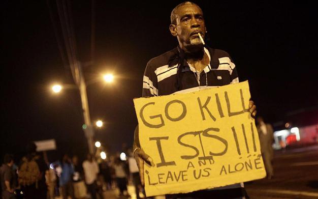US attorney general visits Missouri town for meetings on fatal shooting
