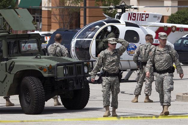 National Guard begins pullout from riot-weary Ferguson