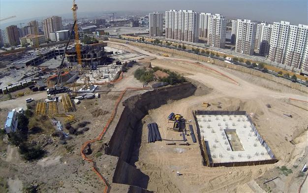 Lone house stands in gigantic construction site in Ankara