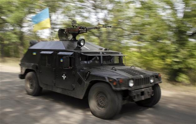 Ukraine warns of great war with Russia as its forces retreat