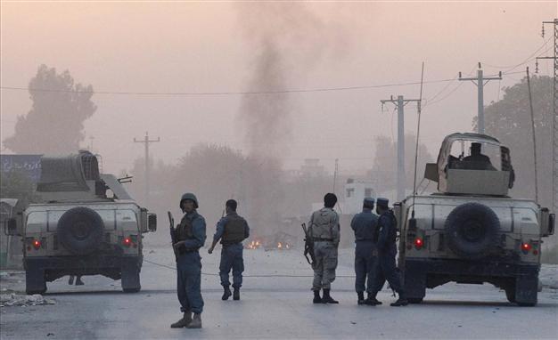 Taliban fighters detonate truck bombs in Afghanistan, killing 18, wounding 150