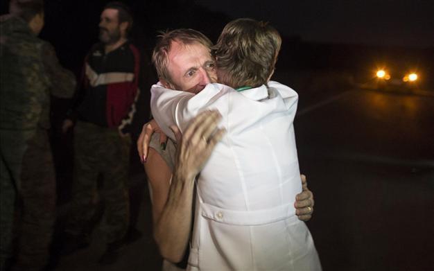 Ukraine, rebels exchange prisoners in peace deal