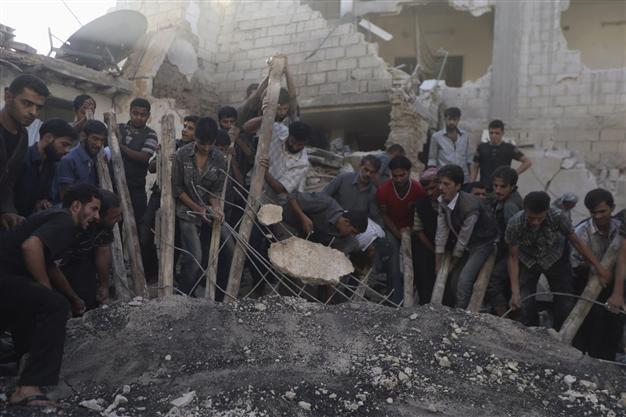 Regime air raids kill 42 near Syria capital: new toll