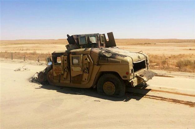 Kerry issues warning after Syria bombs Iraq