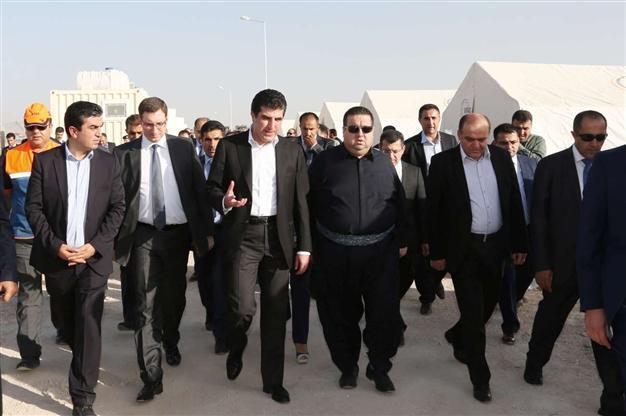 Iraqi Kurdish PM visits refugee camp built by Turkey