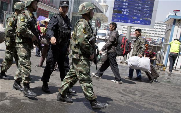 China says 40 rioters killed in restive Xinjiang