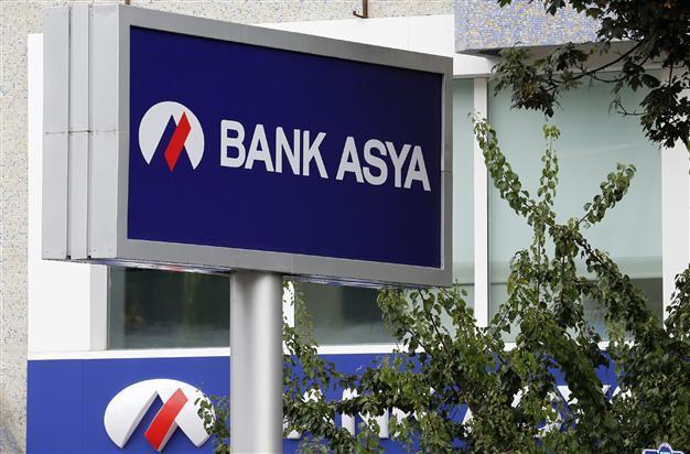 Bank Asya shares firm despite two suspensions in morning session
