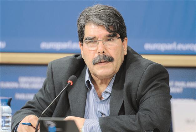 Kobane gets first Turkish aid as Syrian Kurds plead for corridor