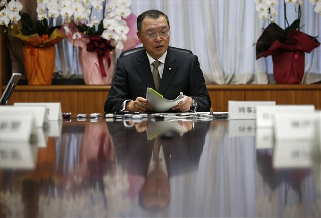 Japan PMs new minister hit by scandal over racy bar bill