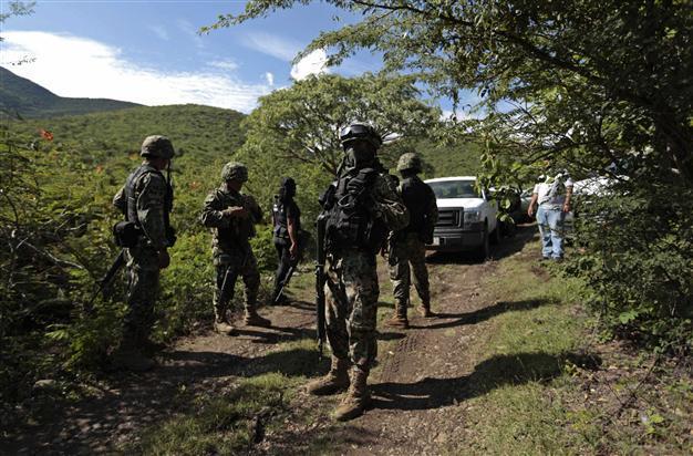 Mexico probes if 43 missing students in mass grave
