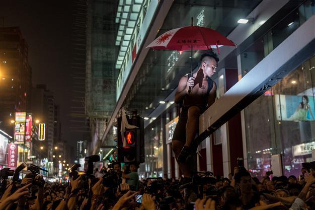 Umbrella Generation: Hong Kongs despairing youth split with old guard