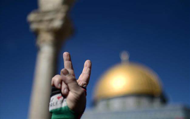 Israeli troops clash with Palestinian protesters over holy site