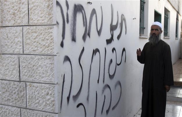West Bank mosque torched in suspected settler hate crime