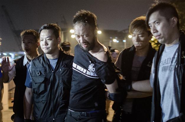 Hong Kong tension rises with police beating of protester