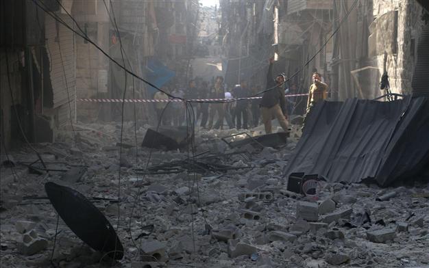 Turkey warns of threat to Aleppo from Assad, fears new refugee influx