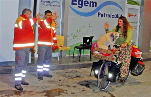 IN PHOTOS: Scottish cyclist interrupts world tour to save stray dog