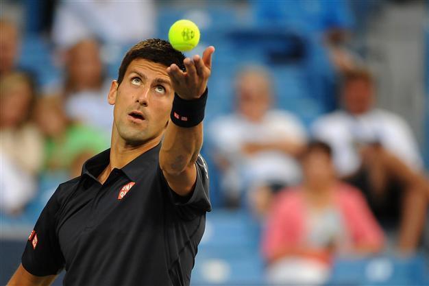 Djokovic outlasts Simon to advance at Cincinnati