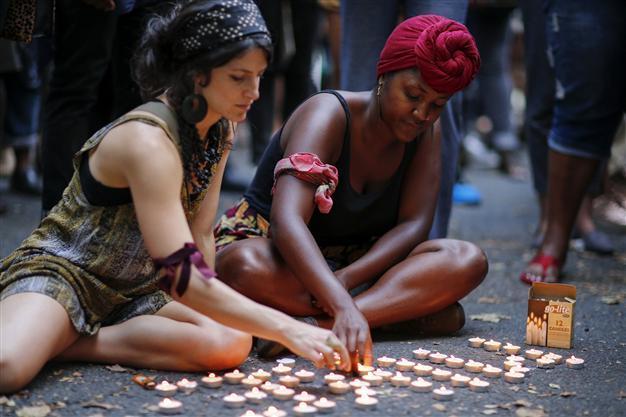 Missouri takes control of security away from Ferguson police as protests spread