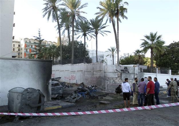 Bombs hit near shuttered Egypt, UAE embassies in Libya