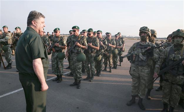 Poroshenko says Ukraine to stay united, sees special status for rebel-held areas