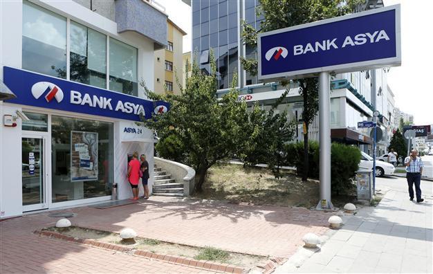 Bank Asya shares tumble on return to trading