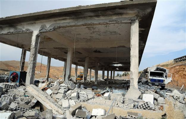 After Syria strikes, Israel vows to deny arms to terrorists