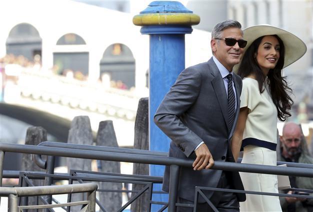 Mrs Clooney outshines new hubby as wedding made official