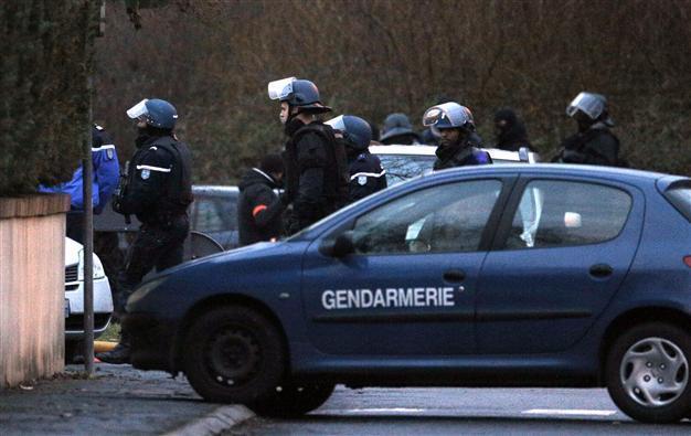 Charlie Hebdo suspects killed as twin sieges rock France