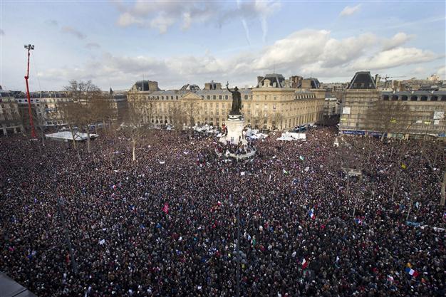Crowds gather for historic Paris march of defiance and sorrow