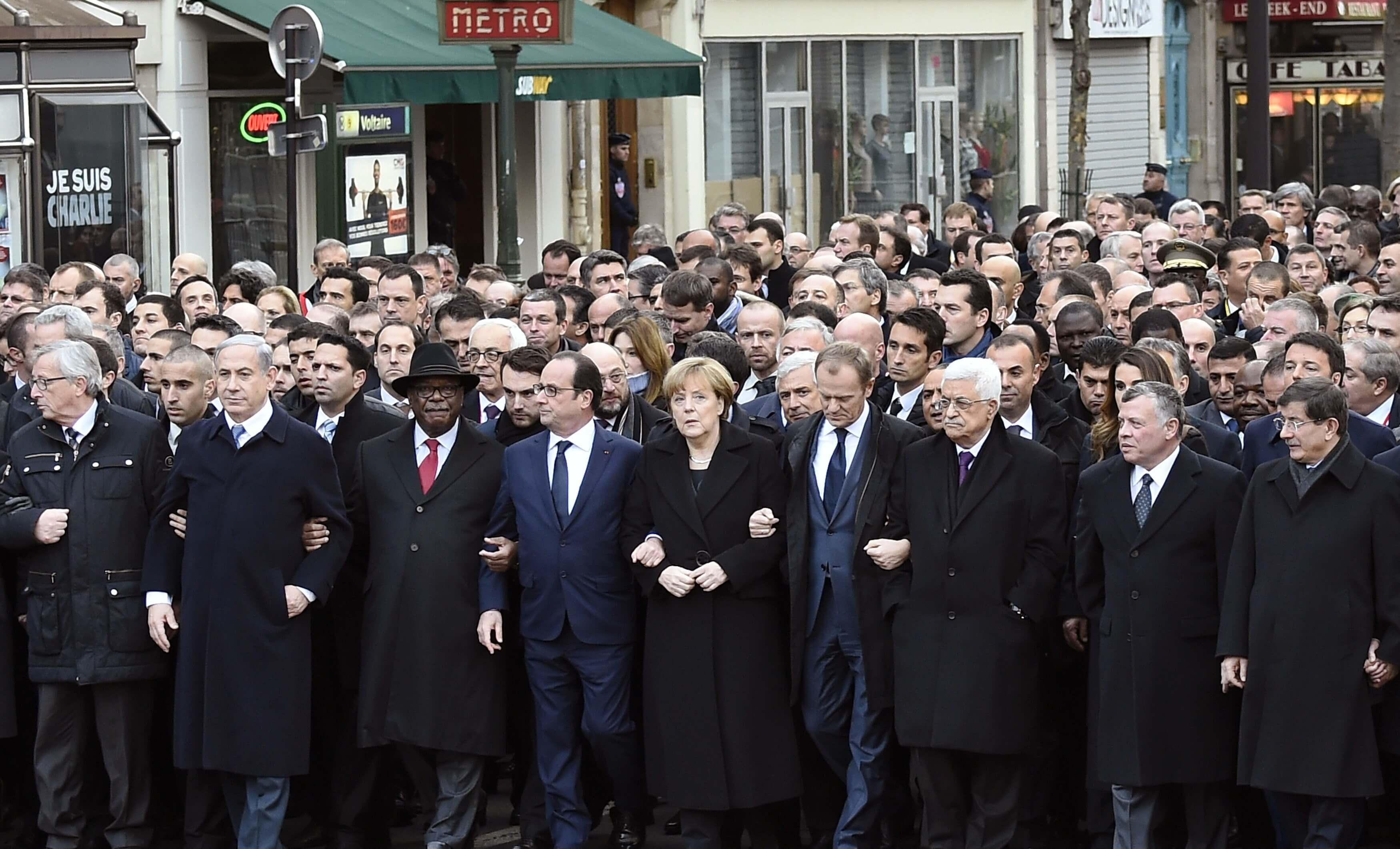 Crowds gather for historic Paris march of defiance and sorrow
