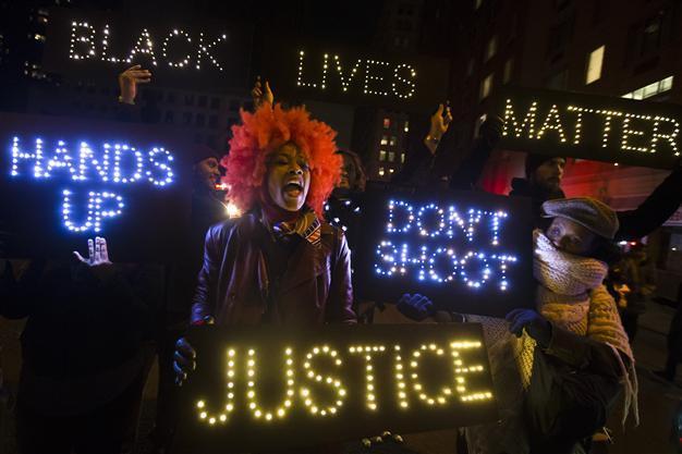 Los Angeles police investigate song mocking slain black teen at ex-cops party