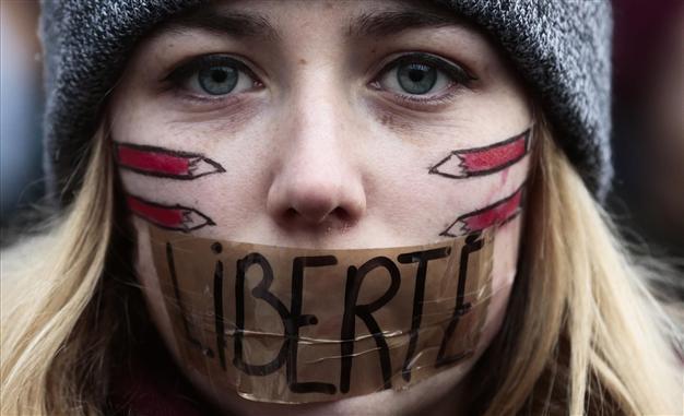 Tens of thousands march across Europe in solidarity with France
