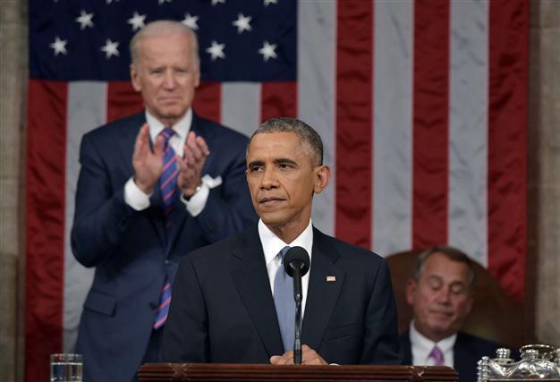 Obama says ‘shadow of economic burst passed’