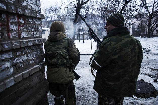 Pro-Russia rebels cement hold on disputed Ukraine airport