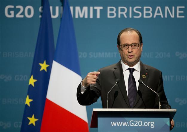 Hollande says wont be pressured over warship delivery to Russia