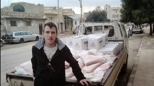 ISIL claims beheading of US aid worker, 18 Syrians