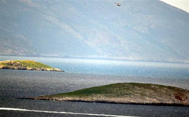 Greek minister leaves wreath at Aegean hotspot, sparking confrontation with Turkey