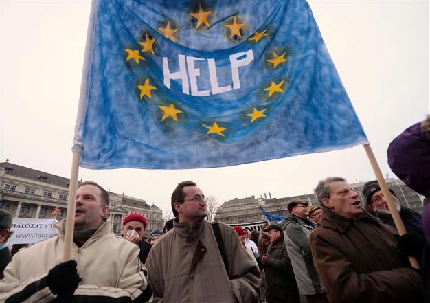 Hungarians rally against Orban ahead of Merkel visit