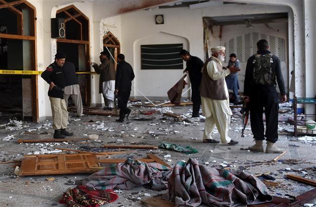 Taliban storm Pakistan Shiite mosque, killing at least 16