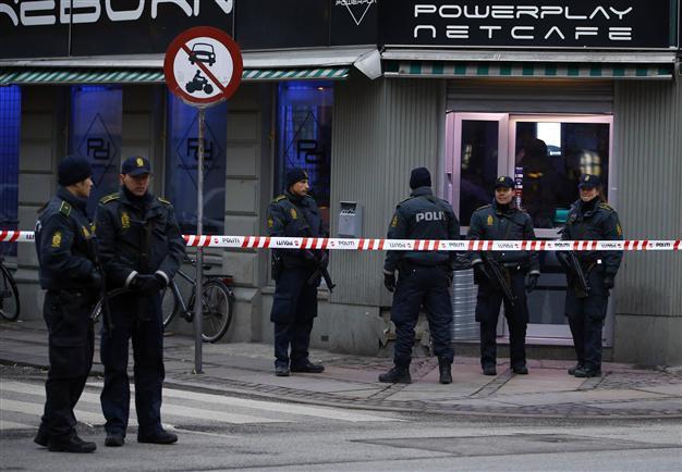Two men charged with aiding Copenhagen gunman: lawyer