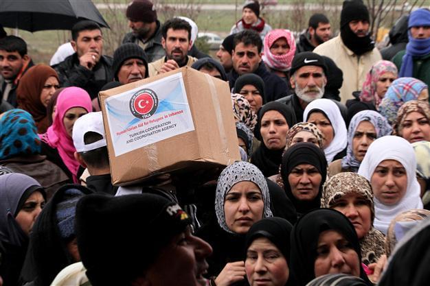 Turkey urges world’s help on Syrian refugees as spending reaches $6 billion
