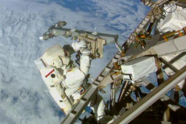 US astronauts begin spacewalk at orbiting lab