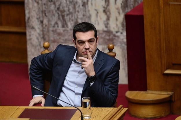Greece in tough climbdown on radical debt promises
