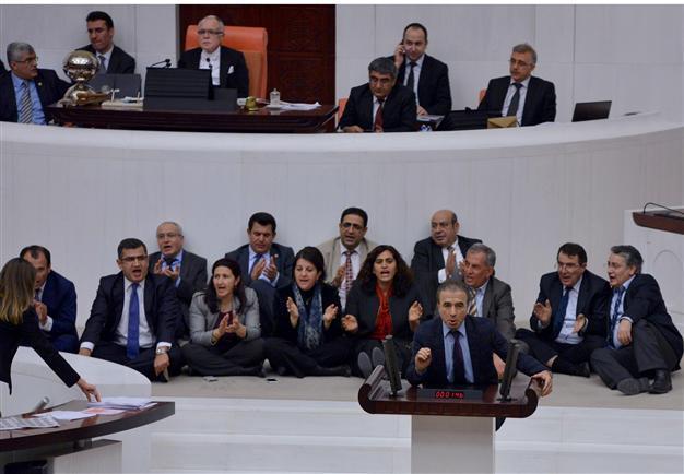 Turkish parliament passes 10 articles of security bill amid protests from opposition